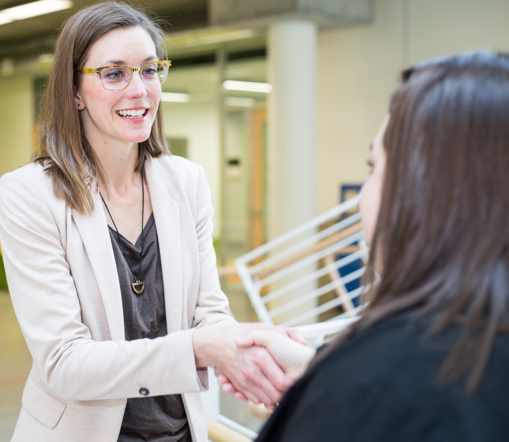 Interviewer and Interviewee shaking hands