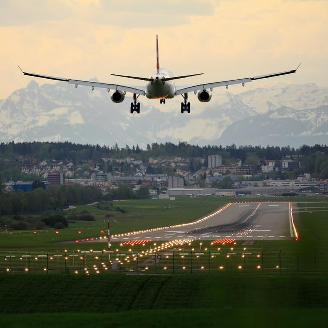 Airplane landing on tarmac 